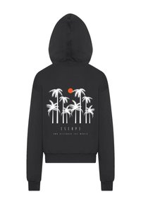 Black hooded sweatshirt featuring a graphic of palm trees and a sun in white and orange. Text reads "ESCAP3 AND DISCOVER THE WORLD."