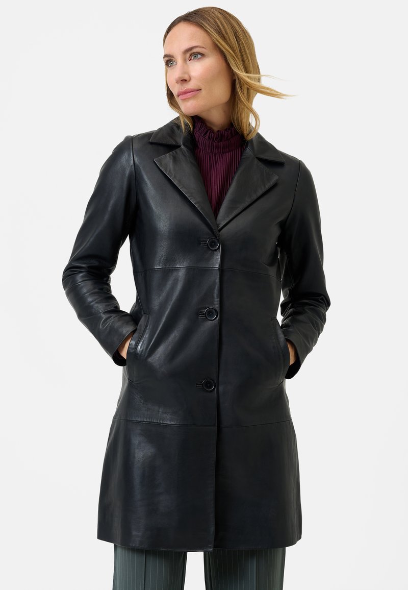 Black leather coat with a fitted design, notch collar, three buttons, and two side pockets. Smooth texture and mid-length fit.