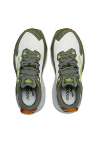 Running shoes in white and olive green with mesh upper, textured laces, reflective accents, and orange heel tab.