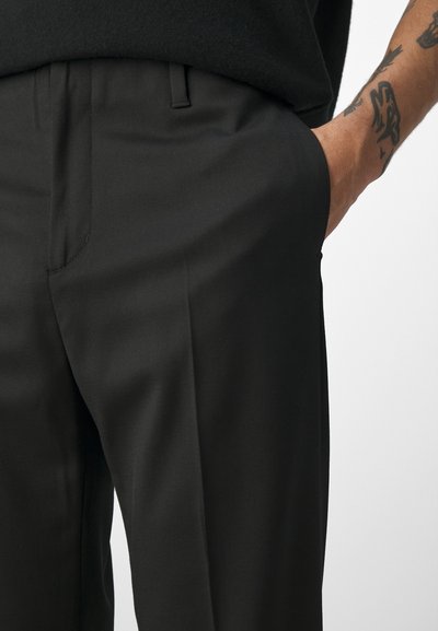 Filippa K BOOTCUT TROUSERS - Stoffhose - black