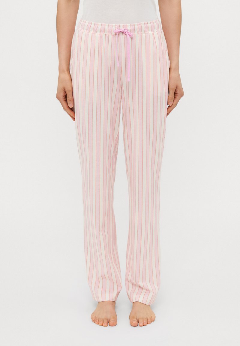 Rosa och vita randiga pyjamasbyxor med dragsko i midjan, tillverkade av mjukt material och med en lös passform för komfort.