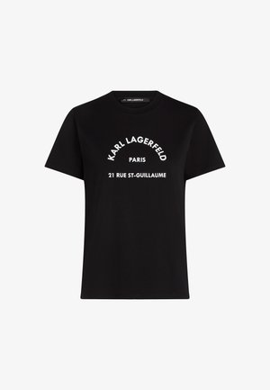 Must värviga puuvillane T-särk valge teksti sõnumiga: "KARL LAGERFELD PARIS 21 RUE ST-GUILLAUME." Klassikaline ümar kaelus ja lühikesed varrukad.