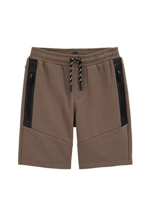 Brune shorts til knæet med elastik i taljen, sort snor og lynlåslommer i sort på siden.