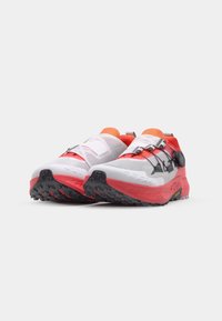 Running shoes with a white mesh upper, red and orange accents, black rubber sole, and a secure lacing system for fit adjustment.