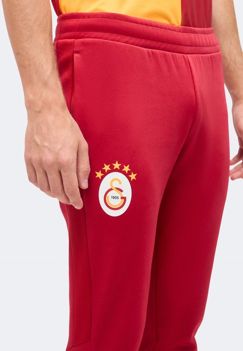 PUMA GALATASARAY SK EVOSTRIPE PANTS - Tracksuit bottoms - dark cherry/summer sunset — photo 6