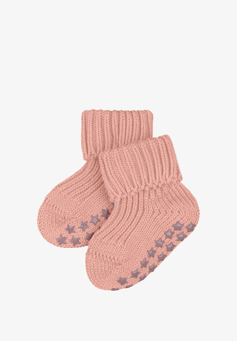 Pink knitted booties with ribbed cuffs and rubber star-patterned soles for grip. Soft fabric and coiled texture enhance comfort and warmth.
