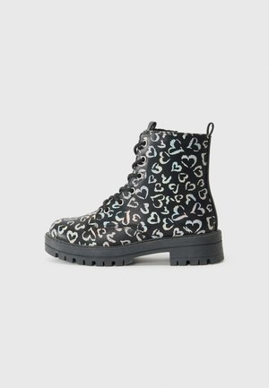 Bottes à lacets - black