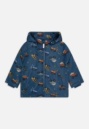 Veste à capuche pour enfants bleu marine avec fermeture éclair, ornée de motifs colorés de véhicules de construction et d'équipements.