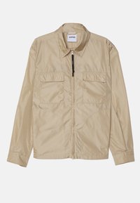 Veste légère beige avec col, fermeture éclair devant et deux poches poitrine à rabat, présentée à plat sur fond blanc.
