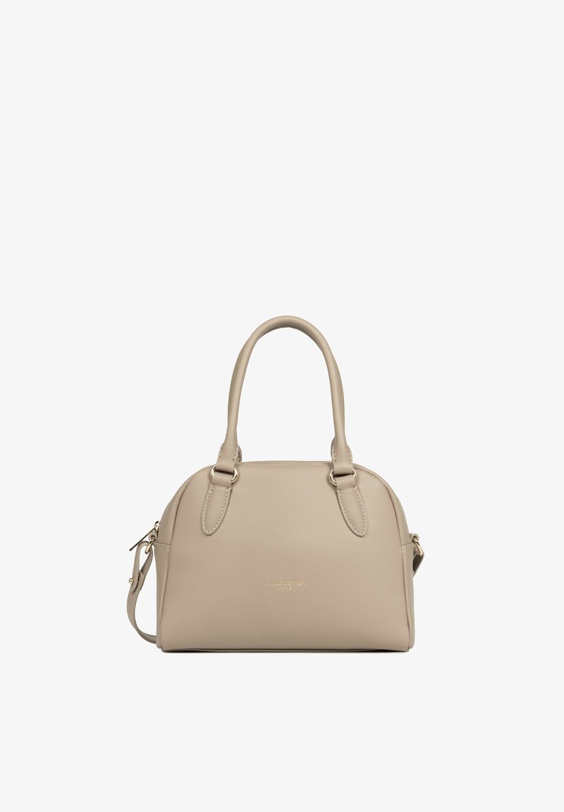 Sac à main en cuir beige avec deux poignées, une bandoulière amovible et un lettrage doré discret de la marque à l'avant.
