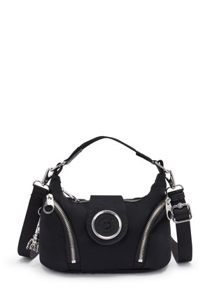Black handbag with dual zippered pockets, central snap closure, metallic accents, and a detachable shoulder strap. Soft material, rounded shape.