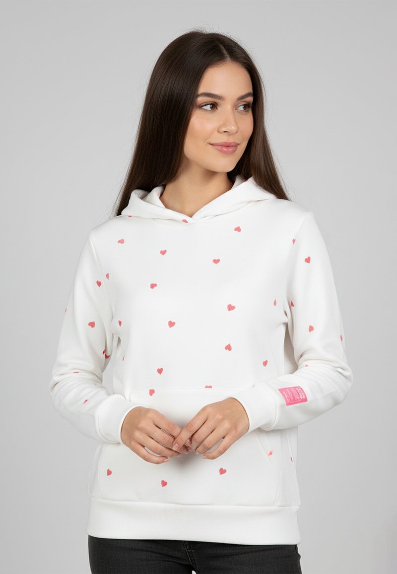 White hoodie with scattered pink heart patterns, kangaroo pocket, drawstring hood, and ribbed cuffs. Smooth fabric texture.