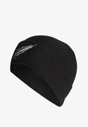 Berretto lavorato a maglia nero con texture a coste. Presenta un design di felce ricamato in bianco sul lato. Costruzione senza cuciture per massimo comfort.