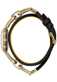 Gold-toned metal watch with a rectangular case, black and orange silicone strap, and a chain-link design on the band.