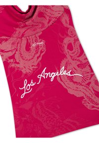 Red sleeveless top with pink dragon patterns, white script text "Los Angeles," and small "Ed Hardy" signature near the neckline.