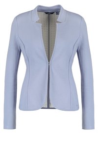 Ljusblå kavaj i en mjuk tygkvalitet, med en kraglös design och dragkedja framtill. Den har långa ärmar och diskret inredningsdetalj.