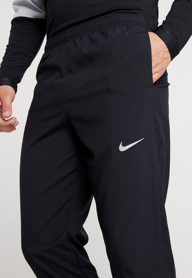 Nike Performance RUN STRIPE - Træningsbukser - black/silver/sort Zalando.dk