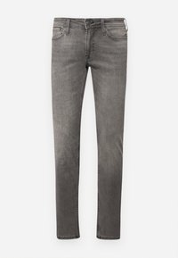 Fakó szürke, slim fit farmerek, öt zsebbel és kontrasztos varrással. Cipzáras záródás és övhurkok jellemzik. Minimalista dizájn.