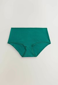Zielone, bawełniane majtki typu hipster, mające bezszwowy design, średni stan oraz miękką fakturę. Charakteryzują się delikatnym szwem na pasie i nogawkach.