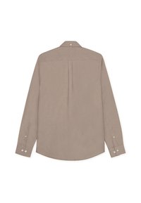 Πουκάμισο με μακριά μανίκια από ανοιχτό μπεζ ύφασμα με απαλή υφή, διαθέτει πίσω λοξό τμήμα, κεντρική πιέτα και μανσέτες με κουμπιά.