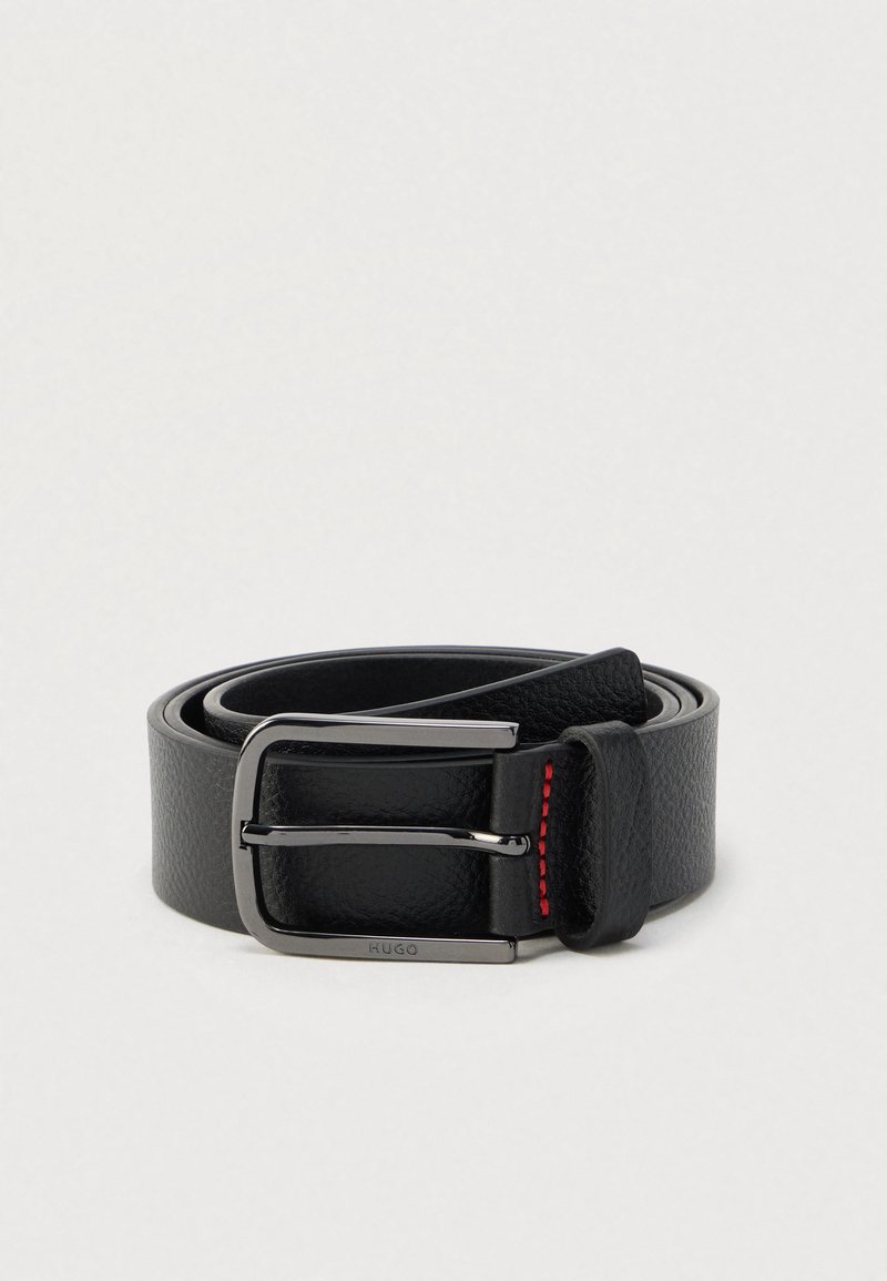 Black leather belt with a silver buckle and red stitching detail, rolled up on a plain light background.