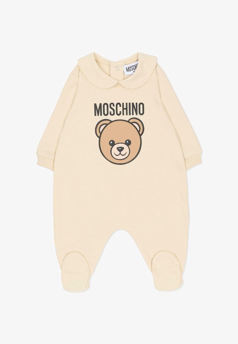 Cremefarbener Strampler mit Bärenmotiv und Schriftzug "MOSCHINO". Weicher Stoff, lange Ärmel, Kragen-Detail und praktisches Fußteil.