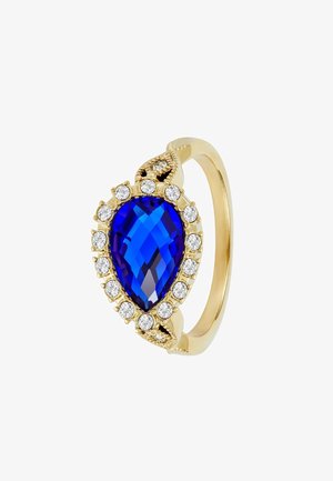 Bague en or avec une pierre précieuse bleu profond en forme de poire entourée de petits diamants ronds clairs dans un sertissage détaillé.