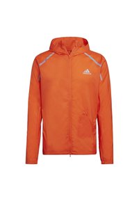 Veste à capuche Adidas orange vif avec fermeture éclair à l'avant, détails réfléchissants sur les épaules et logo sur la poitrine.