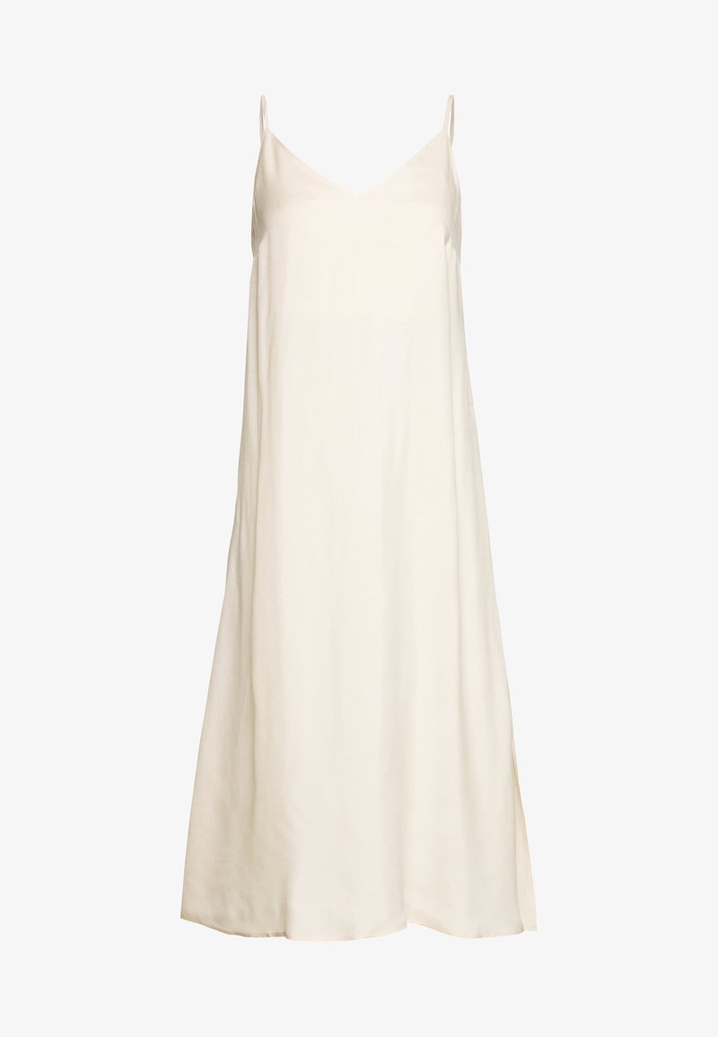 Robe nuisette sans manches couleur crème avec fines bretelles et décolleté en V, coupe fluide mi-longue.