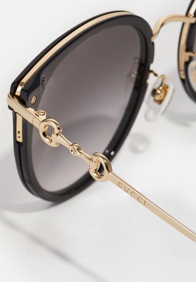 Gucci Sunglasses - black/gold/grey