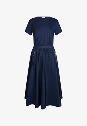 Abito blu navy con top aderente, maniche corte e gonna svasata. Presenta una vita e due tasche con zip. Tessuto morbido.