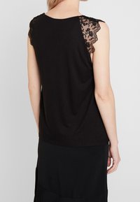 NAF NAF Blůza - black