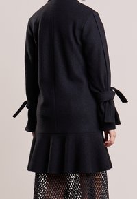 DESIGNERS REMIX Klassischer Mantel - black