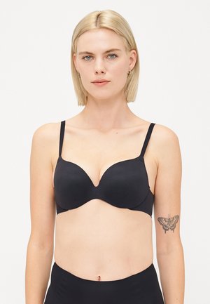 Zwarte onderwired bra met gladde cups en verstelbare bandjes. Heeft een lage plunge-ontwerp en naadloze textuur. Geschikt voor dagelijks gebruik.