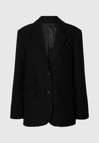 Melns žakete no teksturētas auduma ar neglītu atloku apkakli, divām priekšējām kabatām un divām melnām pogām. Oderēts iekšpuse, lai nodrošinātu gludu apdari.