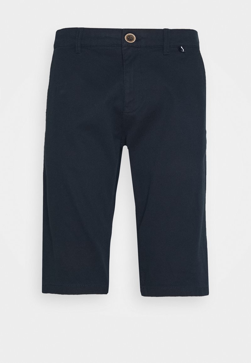 Short bleu marine longueur genou avec fermeture par bouton, passants de ceinture et tissu subtilement texturé, présenté sur un fond blanc uni.
