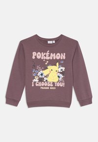 Felpa viola con una grafica centrale che raffigura Pikachu circondato da fiori e testo che recita "POKÉMON I CHOOSE YOU!" in rosa e oro.