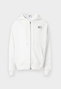 Biela mikina na zips vyrobená z bavlnenej zmesi, s prednou kapsou, kapucňou so šnúrkou a malým čiernym logom Nike na hrudi.