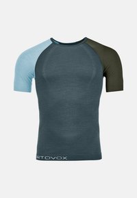 Short-sleeve athletic shirt with dark gray body, light blue left sleeve, olive right sleeve, and white "ORTOVOX" text near hem.