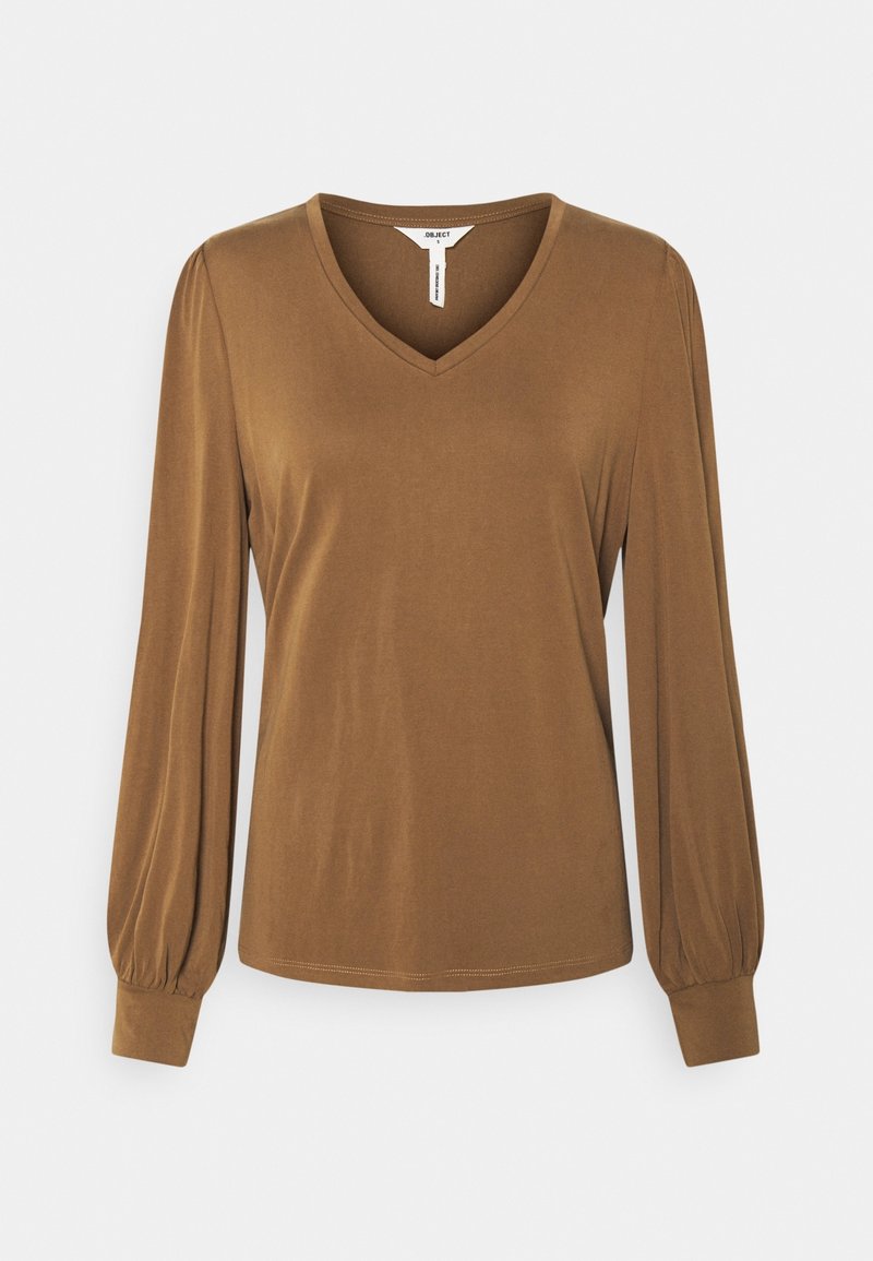 Bruine blouse met lange mouwen, een V-hals en manchetmouwen, gemaakt van zachte, lichte stof.