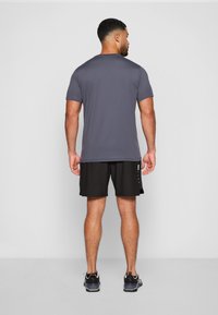 Puma CLOUDSPUN - Camiseta deportiva - galactic gray/black