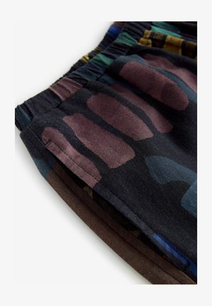 Shorts featuring a black base with colorful abstract patterns in shades of brown, blue, and green; elastic waistband and smooth texture.