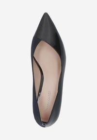 Black and navy pointed-toe pump with a smooth patent toe cap and soft suede side panels, featuring a cut-out design and a neutral inner lining.