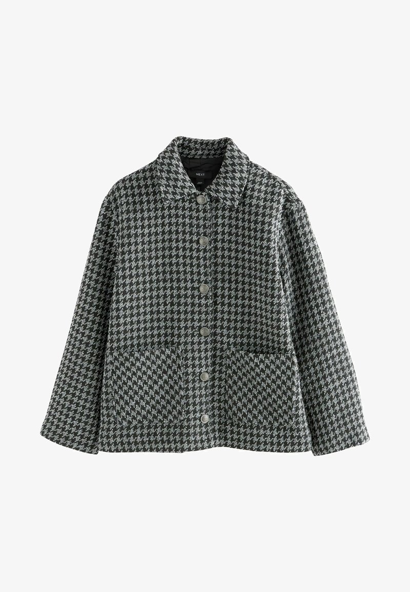 Giacca con motivo houndstooth grigio e nero, con colletto, chiusura a bottoni e due tasche frontali. Tessuto di una consistenza morbida.