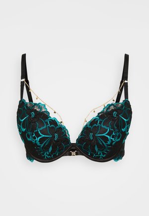 Soutien-gorge noir avec surimpression en dentelle florale turquoise, bonnets rembourrés et bretelles réglables. Présente des chaînes dorées en accents et une fermeture à agrafe à l'avant.