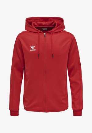 Sudadera roja con cremallera, capucha, mangas largas y puños acanalados. Presenta un logo blanco en el pecho, tejido suave y bolsillos laterales.