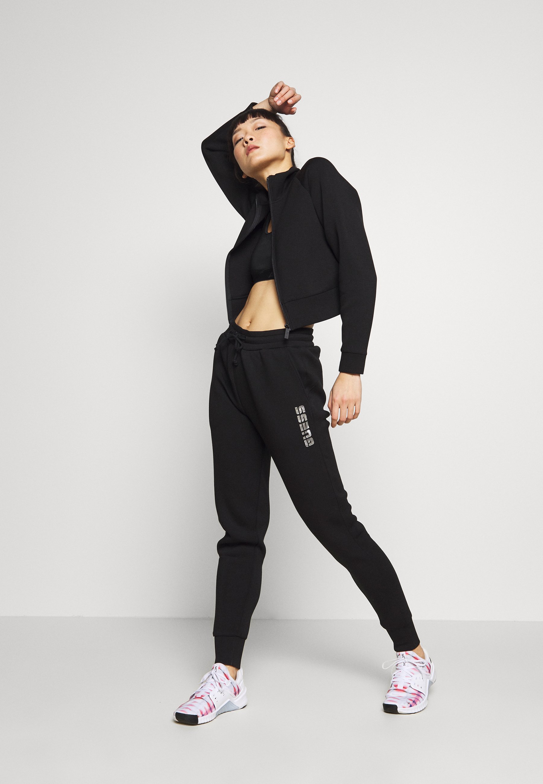 Guess tracksuit bottoms Clearance