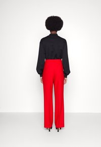 DESIGNERS REMIX Pantalon classique - red