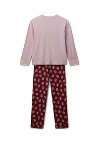 Maglietta a maniche lunghe di colore rosa chiaro con colletto rotondo abbinata a pantaloni bordeaux con un motivo ripetuto di personaggi dei cartoni animati in vari colori.