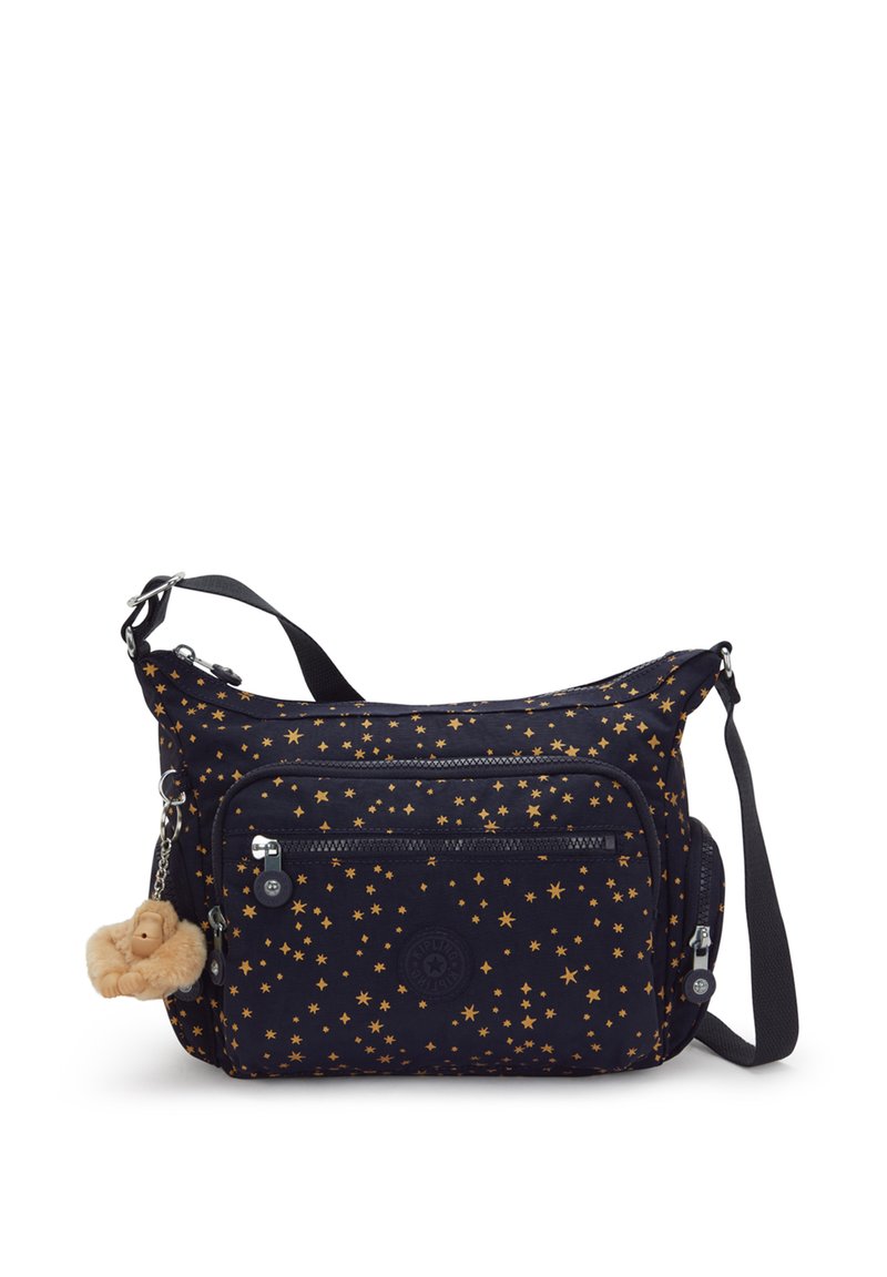 Bolso cruzado navy con estampado de estrellas doradas, compartimentos con cremallera, correa ajustable y un llavero acolchado como acento. Tela duradera.